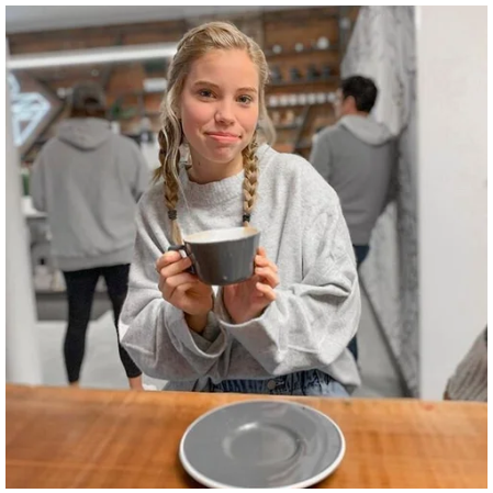 girl drinking coffee at 392Caffe